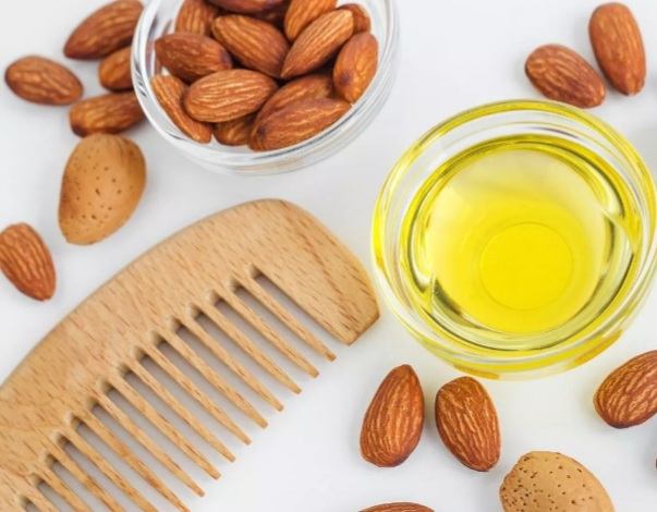 زيت اللوز كنز طبيعي للعناية بالشعر الجاف والتالف